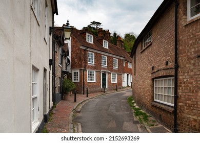 Quaint narrow cobbled picturesque street with traditional terraced cottages in Lewes, East Sussex