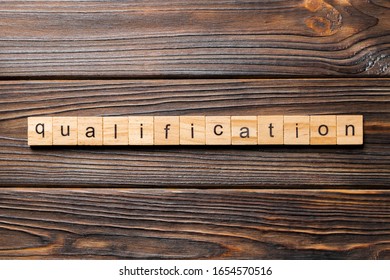 qualification word written on wood block. qualification text on table, concept. - Shutterstock ID 1654570516