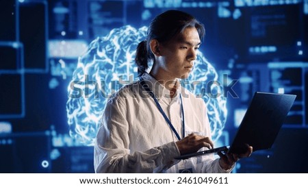Qualified IT consultant in data center uses artificial intelligence computing simulating human brain thought processes. Licensed professional works on laptop with AI machine learning algorithms