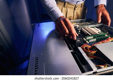 Qualified system network administrator upgrading computer hardware