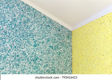 A qualitative transition from blue to yellow liquid wallpaper in the corner of the room