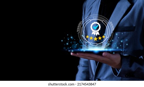 Quality Assurance Concept. Business people show high quality assurance mark, good service, premium, five stars, premium service assurance, excellence service, high quality, business excellence. - Shutterstock ID 2174543847