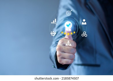 Quality Assurance Concept. Business people show high quality assurance mark, good service, premium, five stars, premium service assurance, excellence service, high quality, business excellence. - Shutterstock ID 2185874507