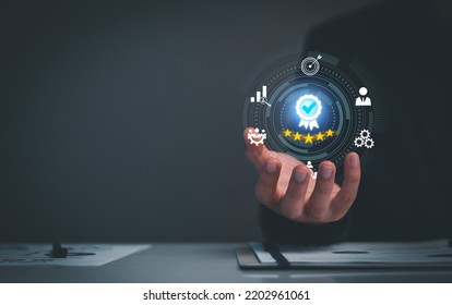 Quality Assurance Concept. Business people show high quality assurance mark, good service, premium, five stars, premium service assurance, excellence service, high quality, business excellence. - Shutterstock ID 2202961061