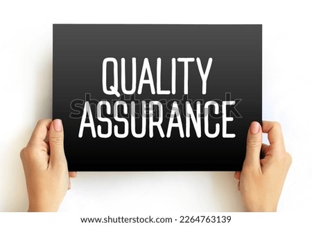 Quality Assurance - systematic process of determining whether a product or service meets specified requirements, text concept on card