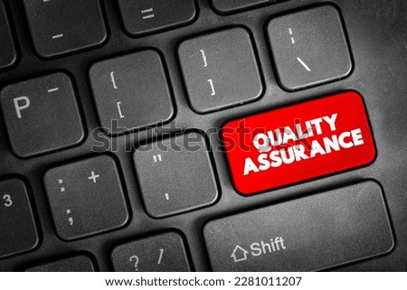 Quality Assurance - systematic process of determining whether a product or service meets specified requirements, text button on keyboard