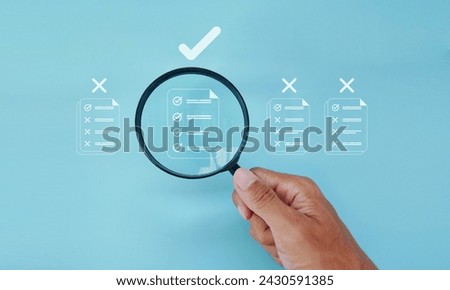 Quality Certificate and Checklist documents examined with a magnifying glass. The concept of standardization, quality management, target marketing planning, certification. Compliance with regulations 