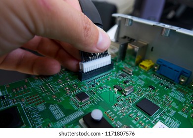 Quality Control And Assembly Of SMT Printed Components On Circuit Board In QC Lab Of PCB Manufacturing High-tech Factory