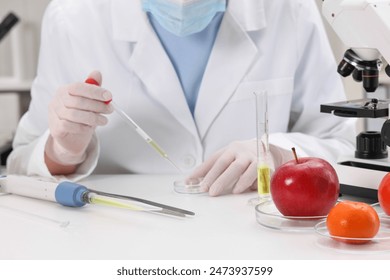 Quality control. Food inspector checking safety of products in laboratory, closeup - Powered by Shutterstock