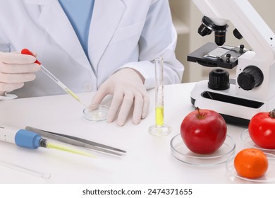 Quality control. Food inspector checking safety of products in laboratory, closeup - Powered by Shutterstock