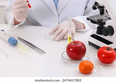 Quality control. Food inspector checking safety of products in laboratory, closeup - Powered by Shutterstock