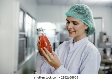 Quality Control And Food Safety Inspector Test And Check Product Contaminate Standard In The Food And Drink Factory Production Line With Hygiene Care.