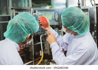 Quality Control And Food Safety Staff Team Inspection Products Contaminate Standard In The Food And Drink Factory Production Line.