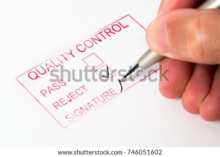Quality Control  
A quality control stamp with pass or reject.