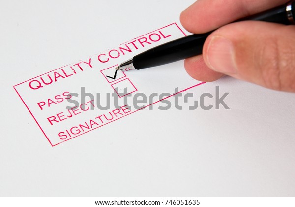 Quality Control  \
A quality control stamp with\
pass or reject.