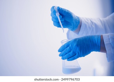 Quality control test of milk in laboratory. Dairy factory industry products. - Powered by Shutterstock