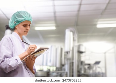 Quality control woman and man wearing a lab coat to checking juice industrial process at factory. Teamwork at production line successful concept.	 - Powered by Shutterstock