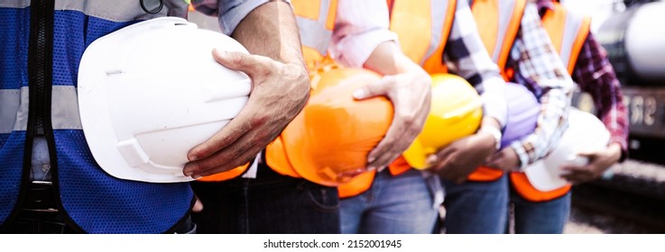 Quality engineers or construction teamwork.Safety PPE concern for engineering or building work site or plant.Wearing helmet and protective equipment can safe workers life in industrial work or plant. - Shutterstock ID 2152001945