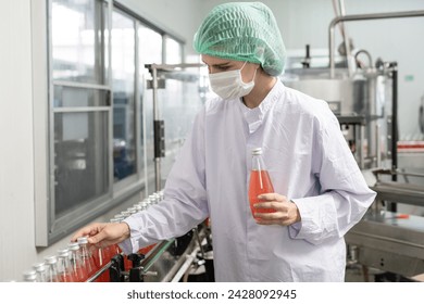 quality inspector food or beverages technician inspection about quality control food or beverages before send product to the customer. Production leader recheck ingredient and productivity. - Powered by Shutterstock