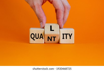 Quality over quantity symbol. Businessman turns cubes and changes the word 'quantity' to 'quality'. Beautiful orange table, orange background, copy space. Business and quality over quantity concept. - Shutterstock ID 1920468725