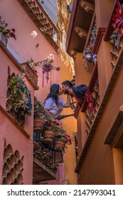 Quanajuato, Mexico - Dec 22, 2021. Kiss Alley Alleyway Colored Houses Guanajuato Mexico. Houses so close couple can exchange a kiss between balconies