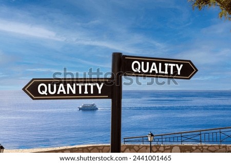 Quantity or quality symbol. Concept word Quantity or Quality on beautiful signpost with two arrows. Beautiful blue sea sky clouds background. Business quantity or quality concept. Copy space.