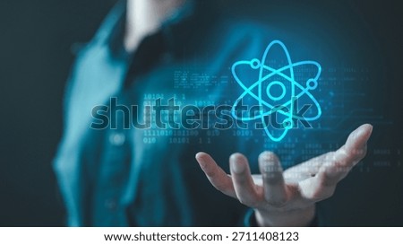 quantum, computing, ai, data, code, network, algorithm, A glowing quantum atom icon floats above a person's hand, symbolizing advanced computing, AI, and futuristic scientific innovation.