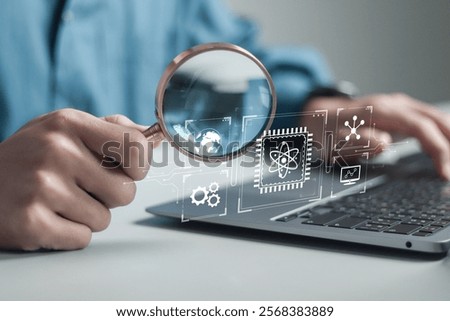 Quantum computing concept, Quantum mechanics, Advanced technology, artificial intelligence and supercomputing. Businessman using laptop with quantum computing icon on virtual screen.