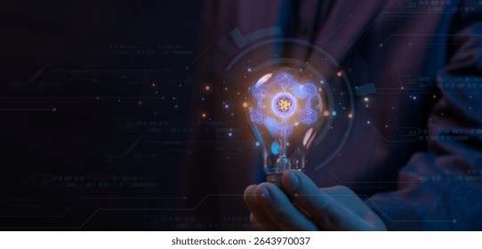 Quantum computing, innovation concept for global network, advancement and exploration. Businessman shows glowing neon line quantum computing icon inside glowing light bulb.