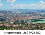 Quanzhou city aerial view including historic Licheng district and Xihu (West Lake) Park, from top of Mount Qingyuan, Quanzhou, Fujian Province, China.   
