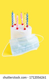 Quarantine Birthday. Burning Candles In Roll Of White Toilet Paper As Birthday Cake And Medicine Mask. Social Distance, Isolation Durante Coronovirus Pandemic