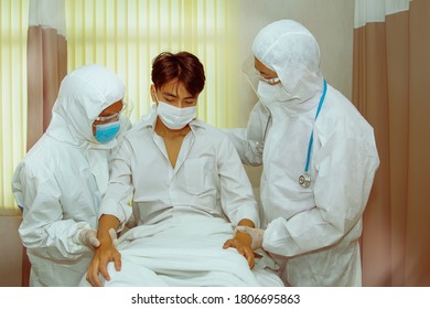 Quarantine facility for respiratory infection in a hospital caring for male patients infected with Coronavirus. (Covid-19) with a high fever sitting in a patient's bed
 - Shutterstock ID 1806695863