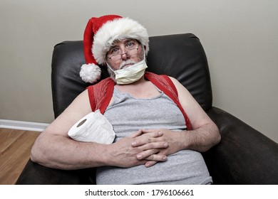 Quarantine Santa Claus In An Recliner Wearing A Mask On His Chin