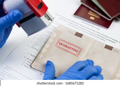 "QUARANTINE" stamped in passport, airport border customs health and safety security check,restrictive no entry measures due to COVID-19 corona virus disease epidemic,Coronavirus global pandemic, UK  - Shutterstock ID 1685671282