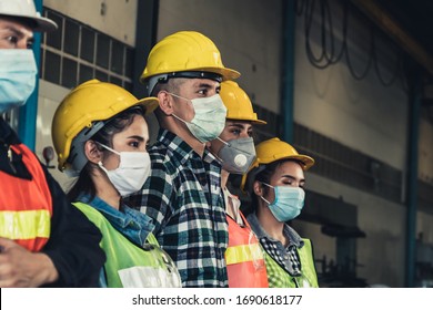 Quarantined masked workers protect spreading of Covid 19 by wearing face masks. Coronavirus Disease or COVID can spread easily without mask. Workers are advised to wear masks during quarantine time.