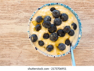 Quark Cheese With Blueberry And Honey In A Bowl