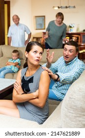 Quarrel Between Husband And Wife In A Large Family. High Quality Photo