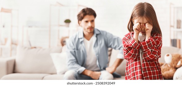 Quarrel With Father. Little girl crying after arguing wIth daddy, angry man on background - Powered by Shutterstock