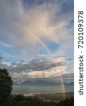 A quarter rainbow lands to the east of Kackemak City Alaska.