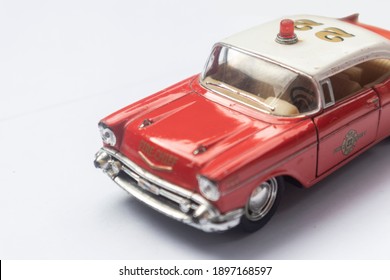 Quarter view of Red toy car with white background . Selective Focus
