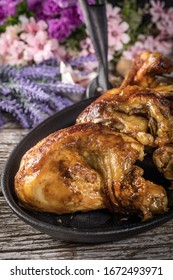 Quarters Of Fried Chicken In A Cast Iron Skillet. Selective Focus.