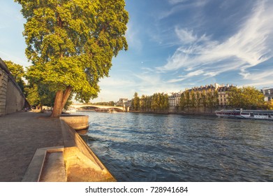 Quay Along River Seine In Paris, France At Daytime. Travel And Architectural Background. Romantic Cityscape.