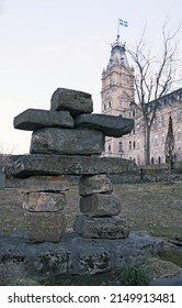 Quebec, Canada - 04-24-2022: Inukshuk In Front Of The Quebec Parliament Building