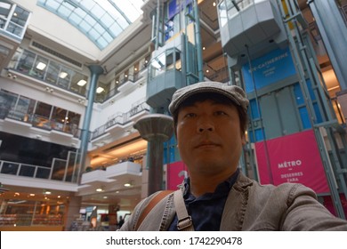 Quebec, Canada, 10 23 2017 : A Man Standing At Montreal Underground City In Place Montreal Trust Area