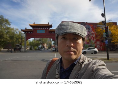 Quebec, Canada, 10 23 2017 : A Man Standing At Quartier Chinois In Boulevard Rene Levesque O Of Montreal City