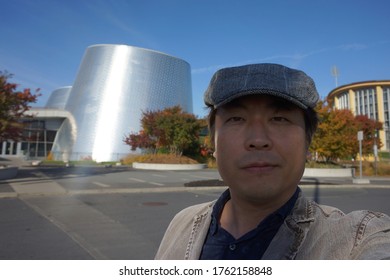 Quebec, Canada, 10 23 2017 : A Man Standing In Front Of Rio Tinto Alcan Planetarium In Parc Olympique De Montreal