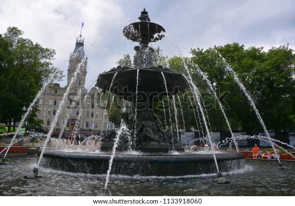 QUEBEC CITY CANADA 07 09 18: In front of\
the Parliament Building, Fontaine de Tourny spent over a century in\
France before becoming a Québec City\
landmark.