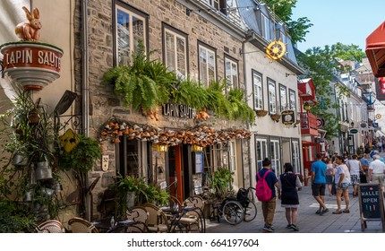 Quebec City, Quebec, Canada - June 2017, pedestrian exploring french charm of old town