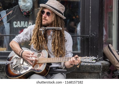 QUEBEC CITY, CANADA - MAY 19, 2018: street musicians in quebec city