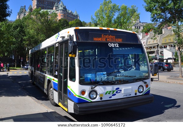 QUEBEC CITY,\
CANADA - SEP 11, 2011: RTC Reseau de transport de la Capitale\
Express Bus in downtown Quebec City, Quebec, Canada. Historic\
Quebec City is UNESCO World Heritage Site.\
